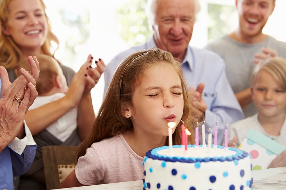 Kid Celebrates Birthday By Ceremoniously Blowing Germs All Over Cake